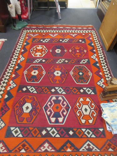 Lot 750 - A Kazak rug early 20th century with geometric...