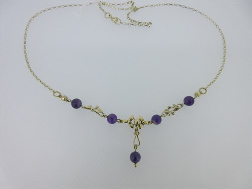 Lot 92 - A 9ct gold necklace with foliate links and amethyst beads