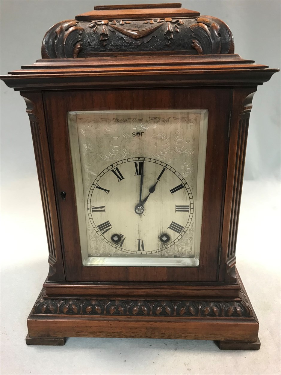 Lot 493 - A late 19th century mahogany mantel clock