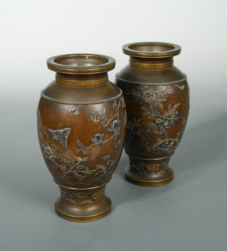 Lot 457 - A pair of Japanese Meiji bronze and mixed metal inlaid pedestal baluster vases