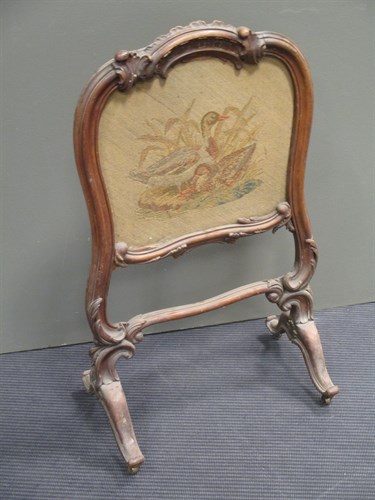 Lot 457 - A fire screen