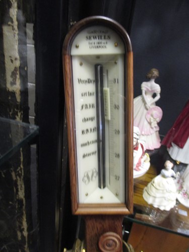 Lot 241 - A Sewills modern barometer in gimbal mount