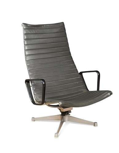 Lot 307 - Charles and Ray Eames, a model EA 124 aluminium group swivel lounge chair