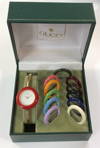 Lot 270 - Gucci - A lady's gold plated bangle watch