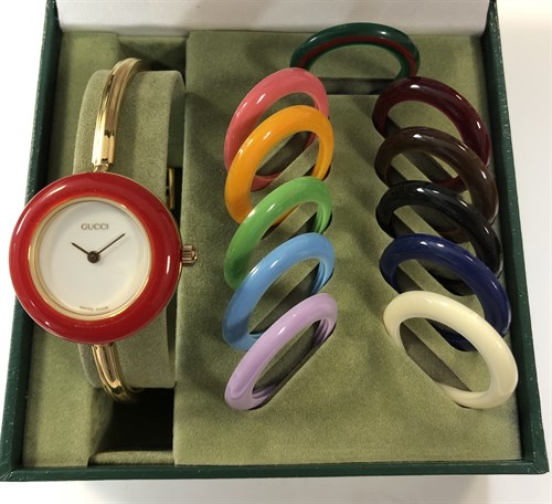 Lot 270 - Gucci - A lady's gold plated bangle watch