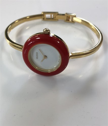Lot 270 - Gucci - A lady's gold plated bangle watch