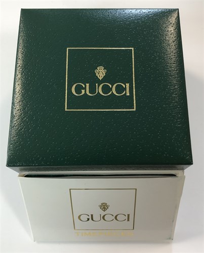 Lot 270 - Gucci - A lady's gold plated bangle watch
