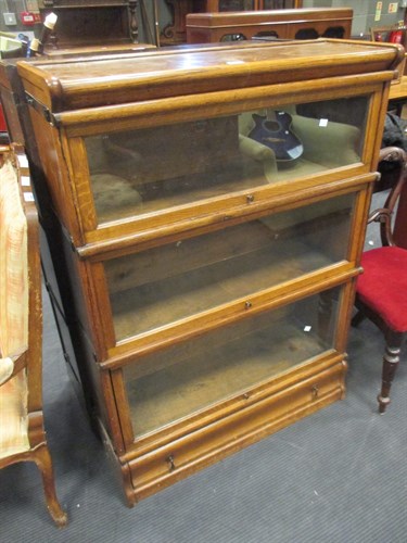 Lot 482 - A pair of medium oak Globe Wernicke 3 section...