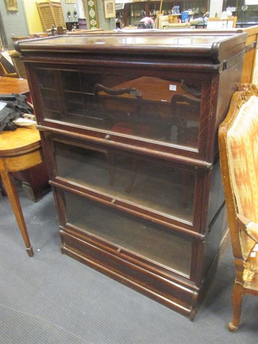 Lot 478 - A pair of dark oak Globe Wernicke 3 section...