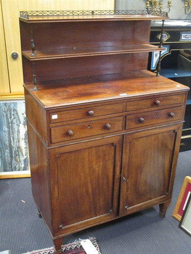 Lot 411 - A Regency mahogany chiffonier with two shelf...