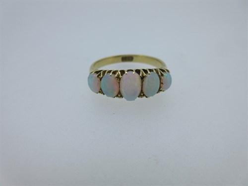Lot 154 - A five stone opal ring