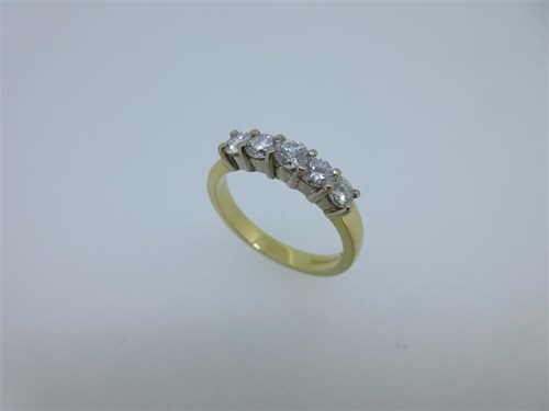 Lot 35 - An 18ct gold and diamond five stone ring