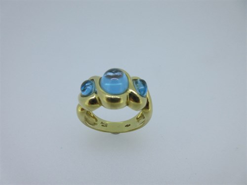 Lot 129 - An 18ct gold ring set with three blue hardstones