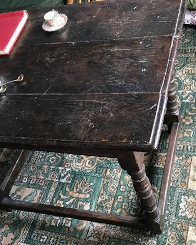 Lot 509 - An early 18th century oak side table on turned...