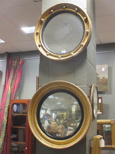 Lot 447 - Two gilt framed circular mirrors, 52cm and...