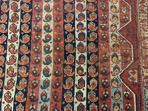 Lot 458 - A Gendje red ground rug