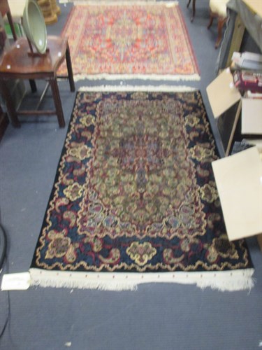 Lot 746 - A modern Bokhara rug with ivory ground and a...