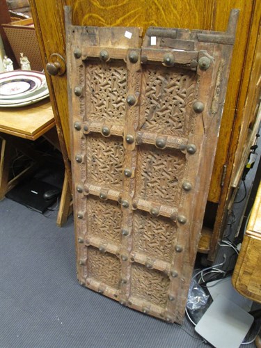 Lot 639 - Two Middle Eastern carved wood door panels...