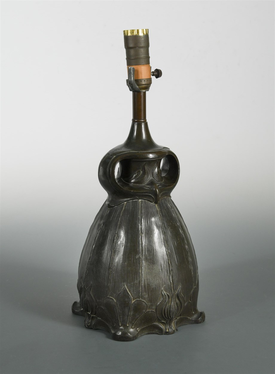 Lot 210 - An Art Nouveau bronzed metal table lamp