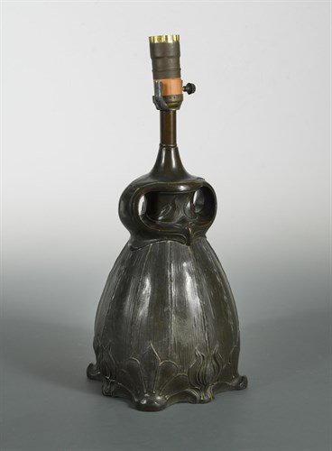 Lot 210 - An Art Nouveau bronzed metal table lamp