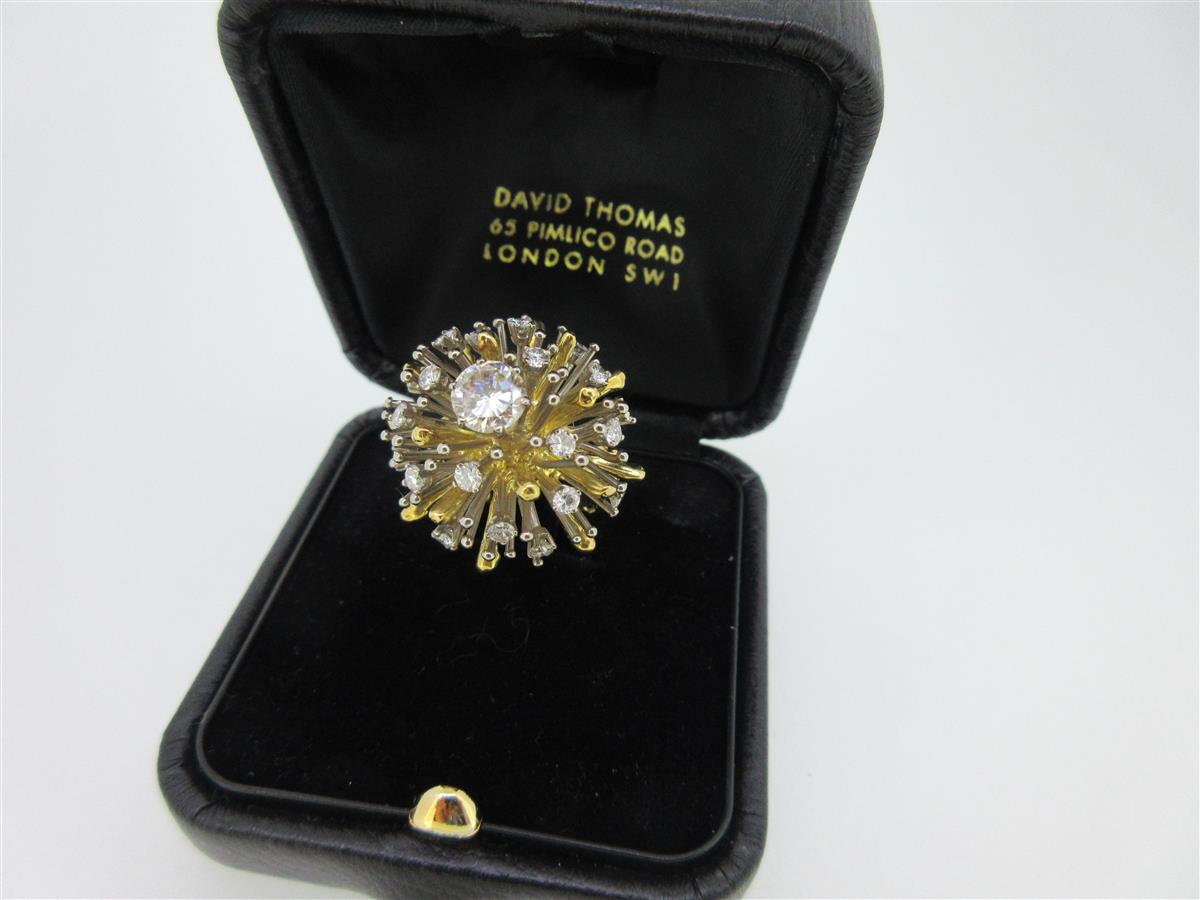 Lot 219 - David Thomas - a diamond set sunburst ring