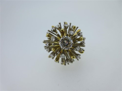Lot 219 - David Thomas - a diamond set sunburst ring