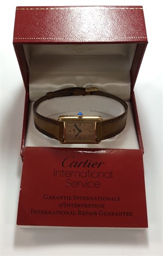 Lot 266 - Cartier - A vermeil 'Les must de Cartier' 'Tank' wristwatch