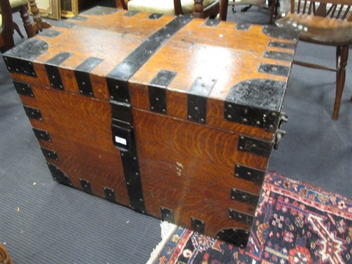 Lot 595 - A Victorian oak and metal bound silver chest,...