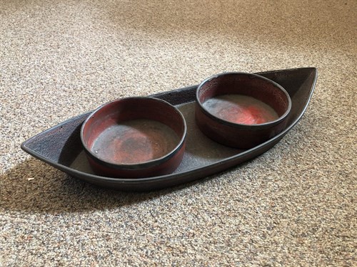 Lot 393 - A Regency red lacquer coaster holder and coasters