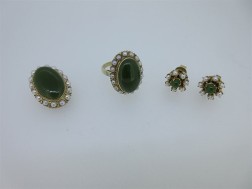 Lot 187 - A nephrite jade and seed pearl suite of ring,...