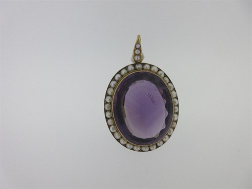 Lot 170 - An amethyst and seed pearl pendant