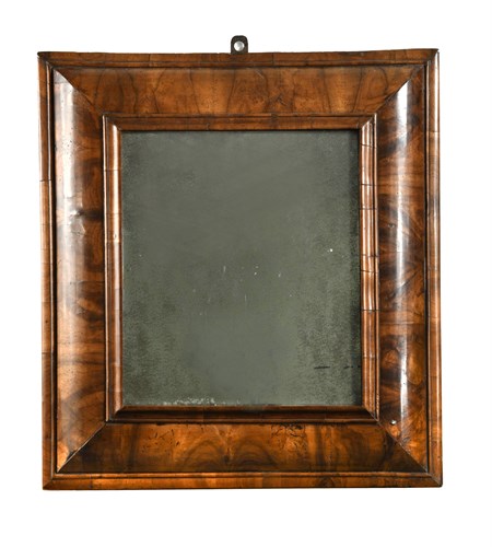 Lot 472 - A William & Mary walnut cushion framed mirror