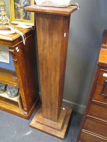 Lot 634 - An Art Deco walnut pedestal 123 cm high