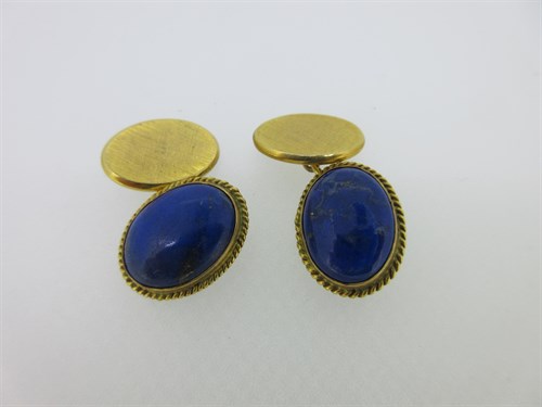 Lot 228 - A pair of cufflinks set with lapis lazuli