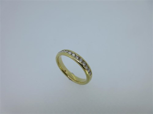 Lot 38 - A modern half hoop diamond ring