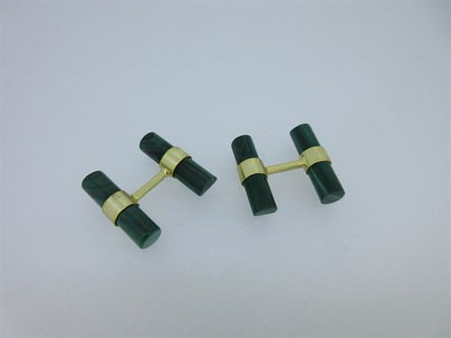 Lot 108 - A pair of malachite baton double-ended cufflinks
