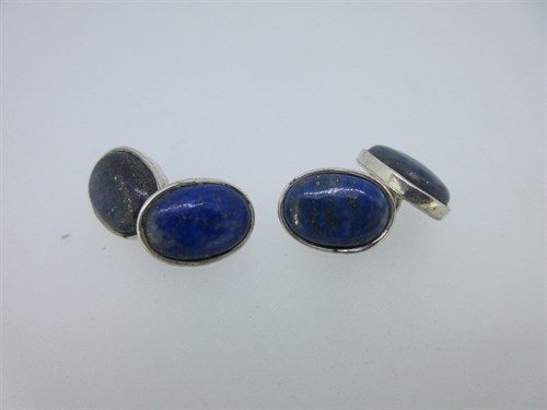 Lot 88 - A pair of lapis lazuli double-ended cufflinks