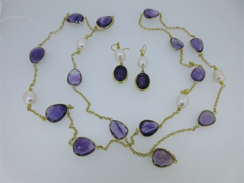 Lot 171 - An amethyst and cultured baroque pearl necklace with a pair of matched ear pendants