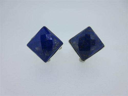 Lot 144 - A pair of cufflinks set with faceted lapis lazuli
