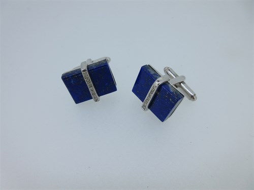 Lot 205 - A pair of lapis lazuli and diamond cufflinks