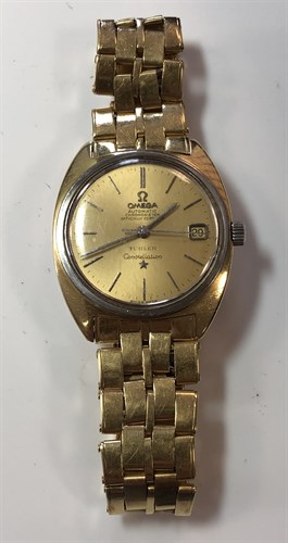 Lot 278 - Omega - A gentleman's 18ct gold 'Constellation' wristwatch retailed by Türler