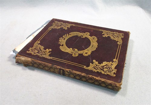 Lot 205 - A Victorian morocco album, with few drawings,...