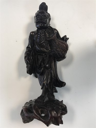 Lot 12 - Three Chinese rosewood figures, Late Qing...