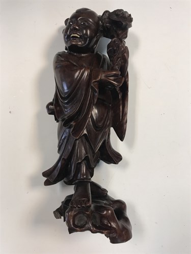 Lot 12 - Three Chinese rosewood figures, Late Qing...