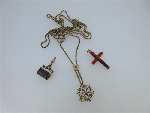 Lot 81 - An opal and seed pearl pendant / brooch on a chain with opal set slider, together with a coral cross and an agate fob