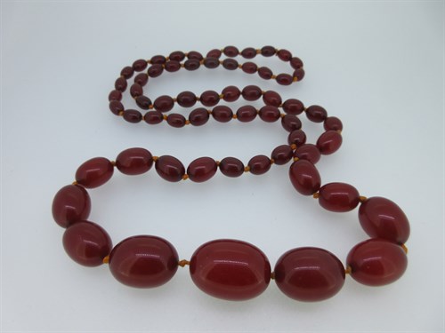 Lot 113 - A graduated necklace of cherry coloured amber beads
