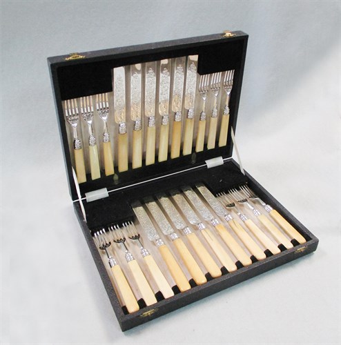 Lot 362 - A cased set of twelve pairs of Victorian silver fruit eaters