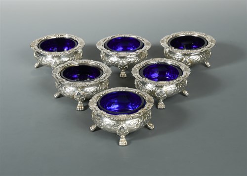 Lot 345 - A set of six George III silver tub salts