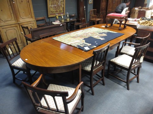 Lot 356 - A Georgian D end extending mahogany table with...