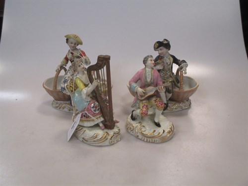 Lot 16 - A pair of Dresden figural bonbonieres with...